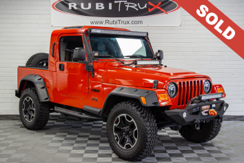 2006 Jeep Wrangler Unlimited RubiTrux Conversion Impact Orange - SOLD