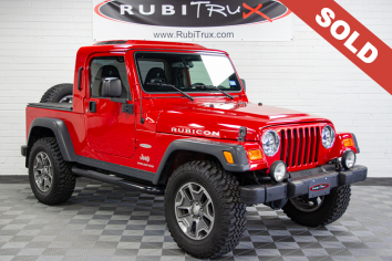 Pre-Owned 2006 Jeep Wrangler Rubicon RubiTrux Conversion Red