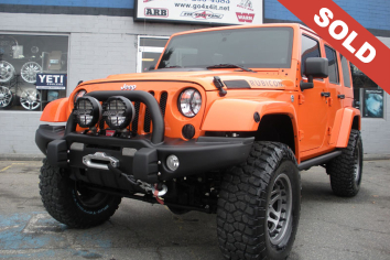 2012 Orange Jeep Wrangler Unlimited Rubicon