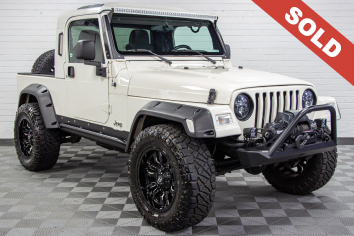 Pre-Owned 2006 Jeep Wrangler TJ Unlimited RubiTrux Conversion Stone White - SOLD